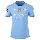 camisa-manchester-city-liga-dos-campeões-24-25-i-home-versão-jogador-1