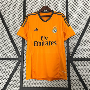 camisa-retrô-real-madrid-2013-14-laranja-1